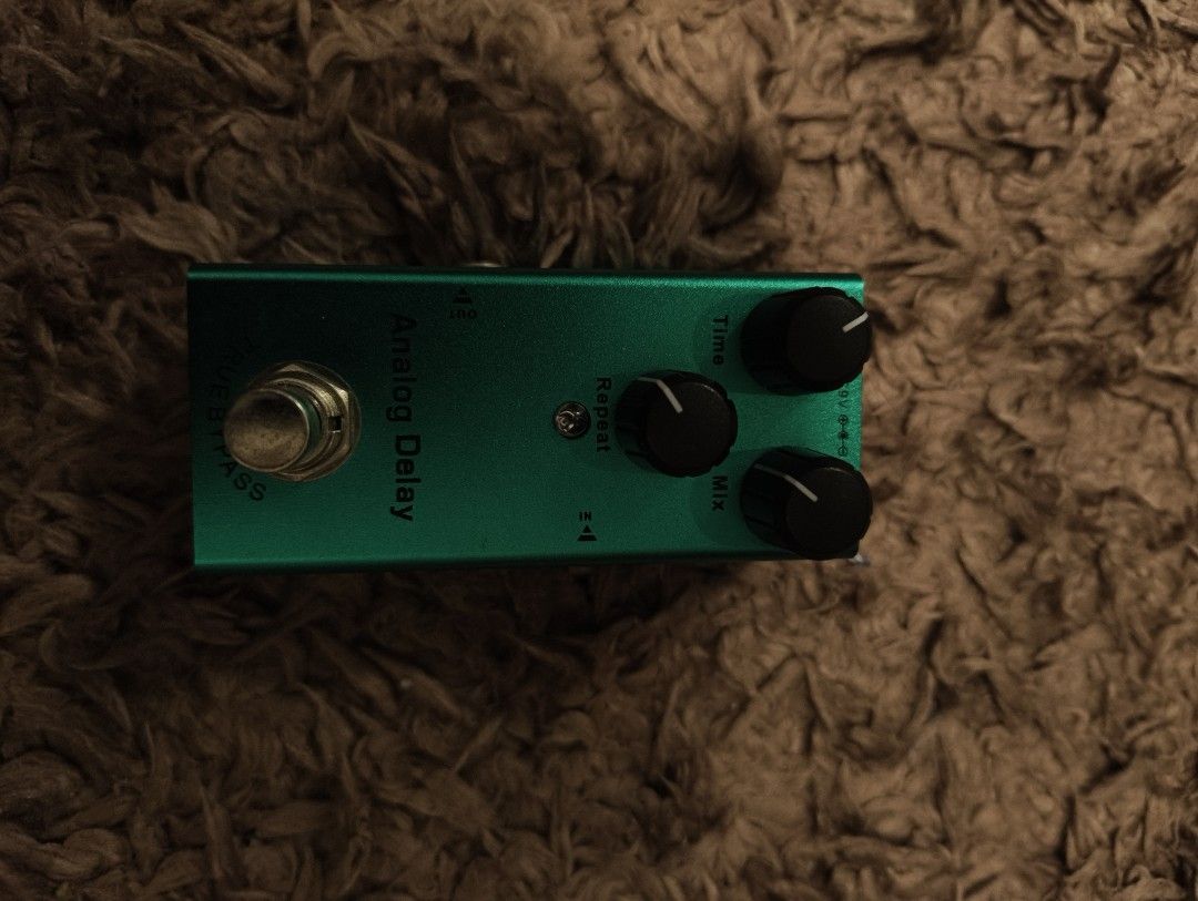 Analog Delay Guitar Pedal (Category: Musical Instruments) located in Rizal. Submitted by norkizz92 (Listing ID 1469865311, Image 1). Description: - Green analog delay guitar pedal - Compact size saves pedalboard space - 3 control knobs: Time, Repeat, and Mix - True bypass switching for pure tone - Delivers warm, classic echo sounds - Powered by a standard 9V adapter.