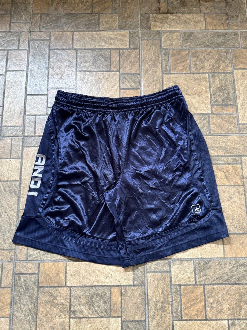 AND1 Shiny Navy Blue Shorts (Category: Shorts) located in Manila. Submitted by dathriftt (Listing ID 1469821688, Image 3). Description: AND1 NAVY BLUE Waist: Freewaist (With Lace) Length: 22 Thigh: 16 Hem: 15 -Colorrate: 9.8/10 -Excellent Condition -Issue: himulmol/rans -Complete Tags & Washtags.