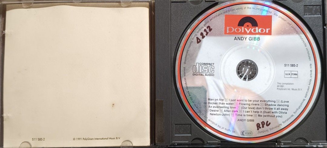 Andy Gibb CD Album Polydor 1991 Compilation (Category: CDs & DVDs) located in Manila. Submitted by ruelcabrer77078 (Listing ID 1469782870, Image 2). Description: - Artist/Album: Andy Gibb Compilation CD - Release Year: 1991 by Polydor - Track Count: 12 tracks total (includes Man on Fire, I Just Want to Be Your Everything, Shadow Dancing, and duet with Olivia Newton-John) - Condition Notes: Jewel case, inserts, and disc feature handwritten notes a