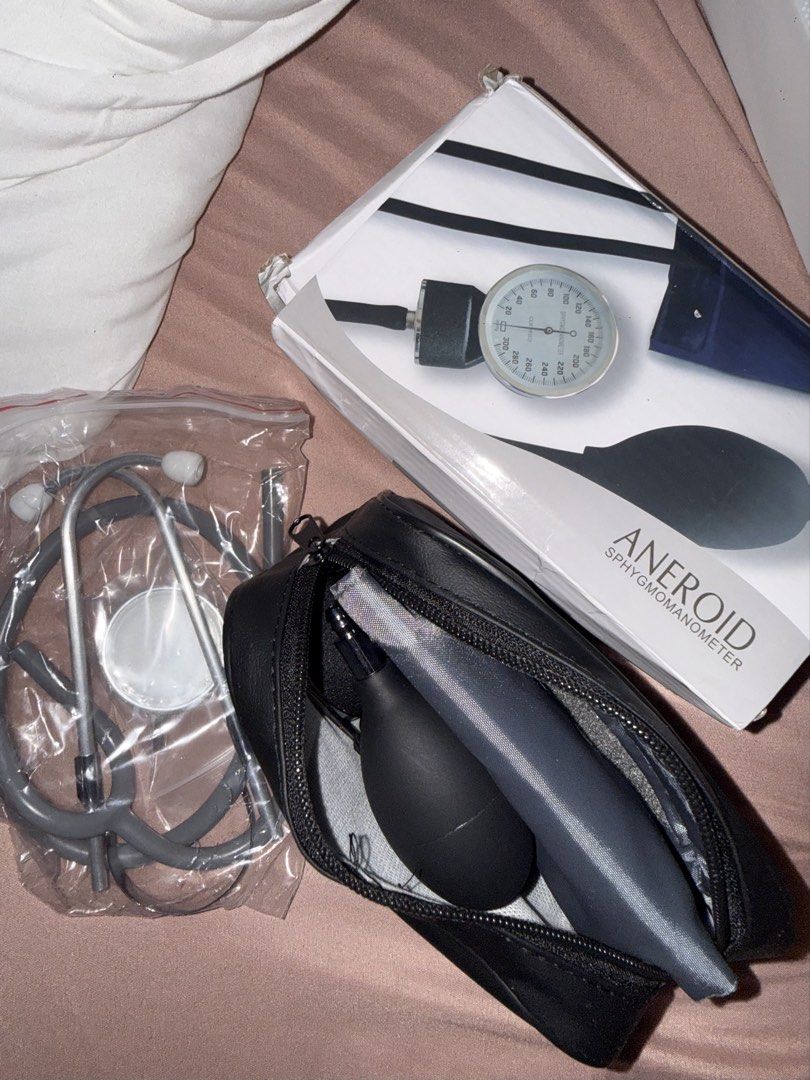 Aneroid Sphygmomanometer and Stethoscope Set (Category: Medical Supplies & Tools) located in Manila. Submitted by razshen_29 (Listing ID 1469867816, Image 1). Description: - Brand new and 100% unused complete manual blood pressure monitor kit - Includes aneroid gauge, inflation bulb, cuff, and a matching grey stethoscope - Comes with a durable black zippered carrying case and original box - All components still sealed in their original bags and p
