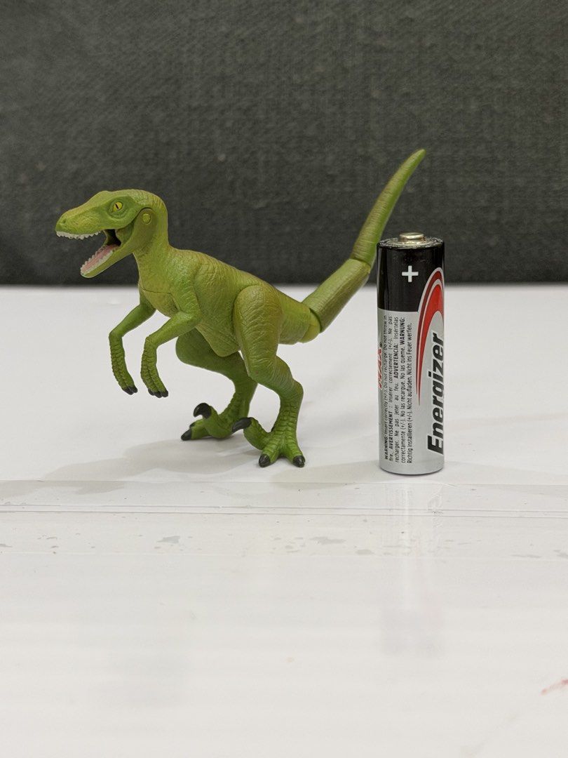 Ania Al-12 Velociraptor (Category: Action & Battle Toys) located in Lipa City. Submitted by cokelight11 (Listing ID 1469901262, Image 1). Description: Ania Al-12 Velociraptor Features: Articulated joints at limbs and tail, detailed skin texture, striking yellow eyes Fully articulated tail, movable legs, and hinged jaw that opens wide. Stands firmly on its own for display or action-packed play Clean, well-maintained, and ready for your collection.