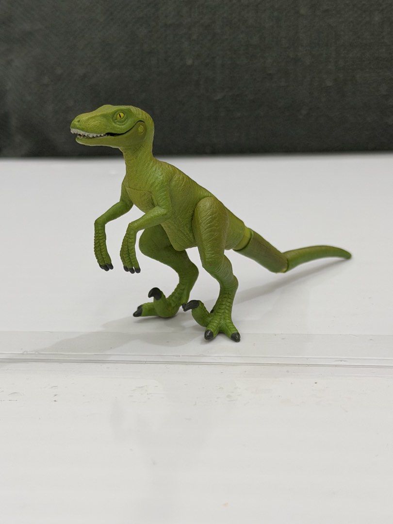 Ania Al-12 Velociraptor (Category: Action & Battle Toys) located in Lipa City. Submitted by cokelight11 (Listing ID 1469901262, Image 2). Description: Ania Al-12 Velociraptor Features: Articulated joints at limbs and tail, detailed skin texture, striking yellow eyes Fully articulated tail, movable legs, and hinged jaw that opens wide. Stands firmly on its own for display or action-packed play Clean, well-maintained, and ready for your collection.