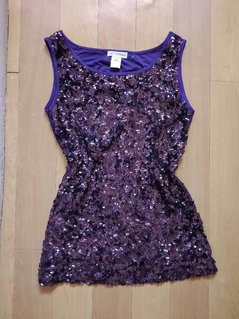 Anna-Kaci Purple Sequin Tank Top Size L (Category: Sleeveless) located in Cabuyao City. Submitted by love.gie (Listing ID 1469947208, Image 1). Description: - Color: Purple with dark sequins - Material: 100% polyester (lightweight and comfortable) - Fit: Comfortable fit - Details: Brand and size t attached at the collar Size: Large Price: 250 +sf.