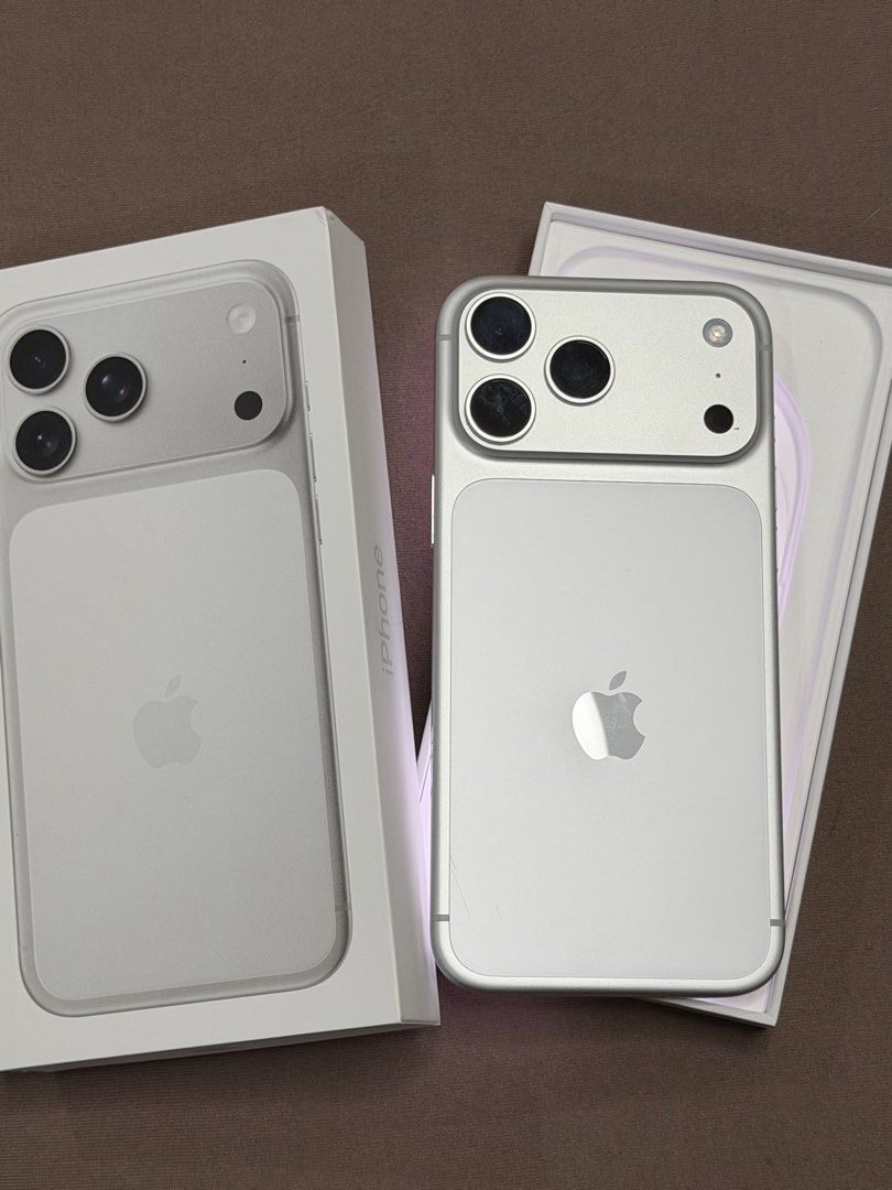 Apple iPhone (Category: iPhone 17 Series) located in Marikina City. Submitted by junnoturiano (Listing ID 1469870077, Image 1). Description: IPhone 17 PRO MAX 256GB SILVER with ORIGINAL BOX Under WARRANTY until DECEMBER 2026 - Condition: FLAWLESS SIDES (only issue: SMALL DOT at CAMERA PLATEAU area — see attached photos) - Battery Health: 92% capacity (437 cycle counts) RFS: UPGRADED already (extra phone na) Loc: MARIKINA CITY Price: 62,000 PESOS 
