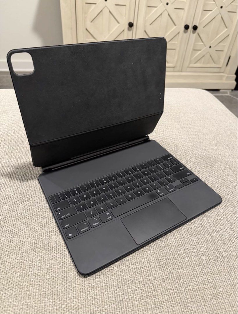 Apple Magic Keyboard iPad Pro model A1998 Original rush (Category: Cases & Sleeves) located in Caloocan City. Submitted by kennanmanalo (Listing ID 1469868437, Image 1). Description: Black Apple Magic Keyboard (Model A1998) is for the 12.9-inch iPad Pro. This polyurethane accessory has a full-size keyboard with backlit keys and a multi-touch trackpad. It includes a pass-through USB-C charging port. The unit is compatible with iPad Pro 12.9-inch (