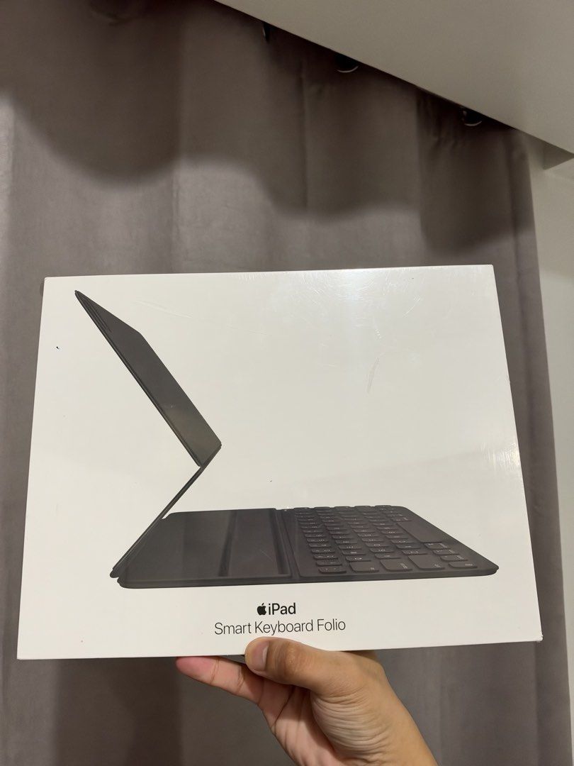 Apple Smart Keyboard Folio for iPad Pro 12.9-inch (Category: Laptops & Notebooks) located in Mandaluyong City. Submitted by kier_ad (Listing ID 1469864928, Image 1). Description: Brand new and sealed. Bought from beyond the box (with receipt) Last price already. Fits ipad pro 13in 3rd to 4th gen and ipad air m2 to m4 13inch. Location: Mandaluyong.
