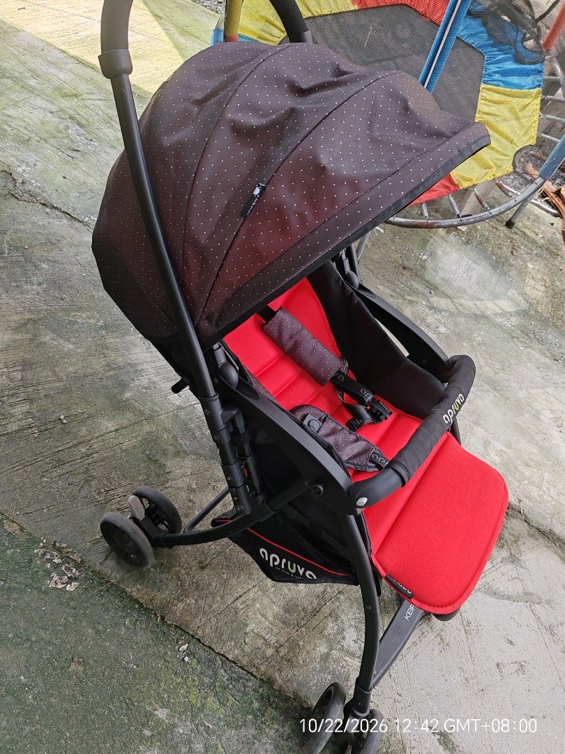 Apruva Keiryo Baby Stroller Red Black (Category: Strollers) located in Antipolo. Submitted by purpleclover11 (Listing ID 1469812141, Image 3). Description: - Brand: Apruva Keiryo Baby Stroller - Color: Red and black with stylish polka dot canopy hood - Comfort & Safety: Adjustable seat, secure safety straps, and matching harness covers - Storage: Convenient bottom storage basket included - Mobility & Storage: Compact folding mechanism with easy-t