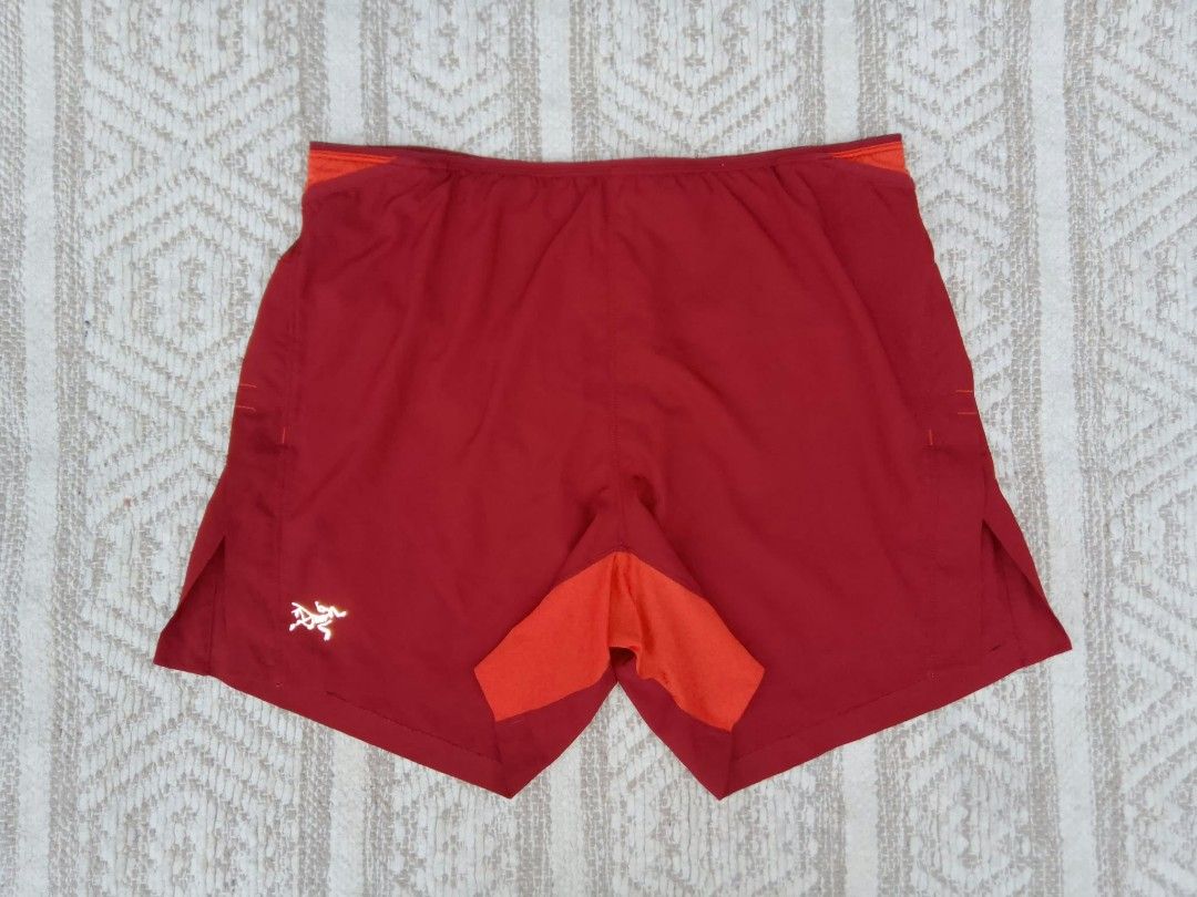 Arc'teryx Men's Running Shorts Size S Red Orange (Category: Shorts) located in Quezon City. Submitted by cruz_robert (Listing ID 1469807643, Image 3). Description: - Brand: Arc'teryx - Item: Men's Running Shorts - Size: Small to medium - Color: Deep red with orange contrast panels and inner lining - Liner: Built-in mesh brief liner for comfort - Waistband: Elastic with internal drawcord - Pocket: Back stash pocket at the waist - Branding: Reflect