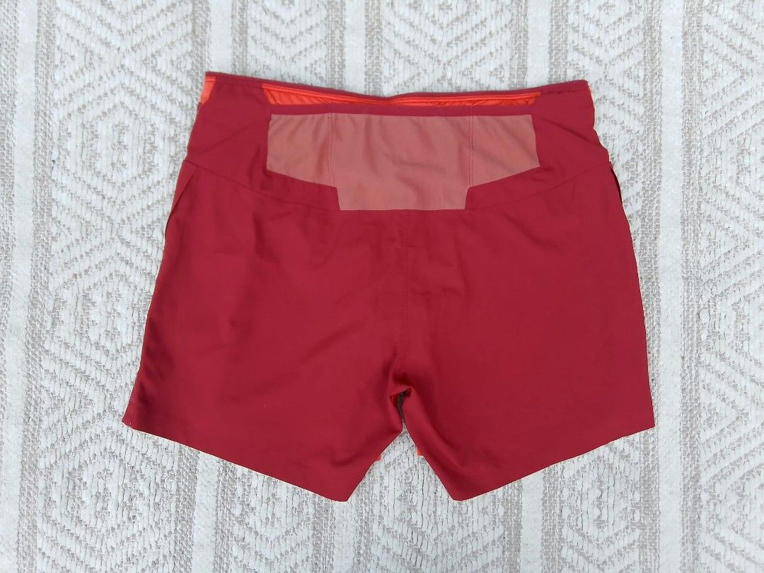 Arc'teryx Men's Running Shorts Size S Red Orange (Category: Shorts) located in Quezon City. Submitted by cruz_robert (Listing ID 1469807643, Image 2). Description: - Brand: Arc'teryx - Item: Men's Running Shorts - Size: Small to medium - Color: Deep red with orange contrast panels and inner lining - Liner: Built-in mesh brief liner for comfort - Waistband: Elastic with internal drawcord - Pocket: Back stash pocket at the waist - Branding: Reflect