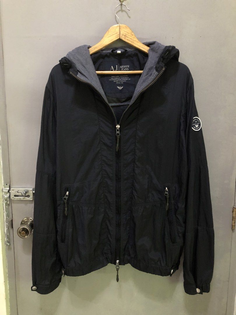 Armani Jeans Windbreaker (Category: Coats, Jackets and Outerwear) located in Pasig City. Submitted by raymundo_rj24 (Listing ID 1469908608, Image 1). Description: Width - 24.5 Length - 27.5.