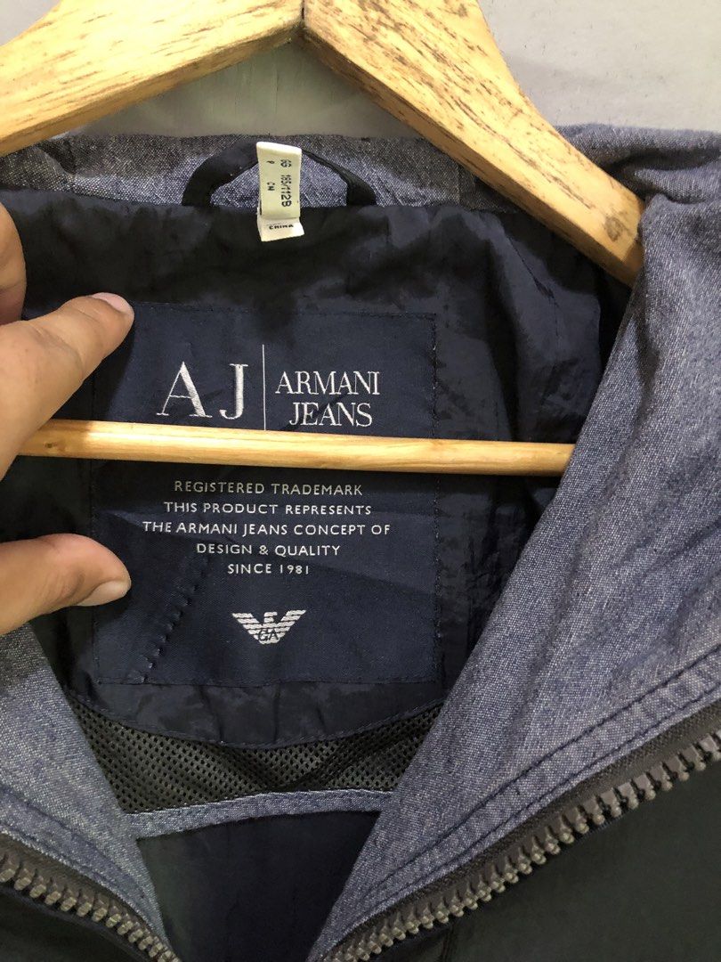 Armani Jeans Windbreaker (Category: Coats, Jackets and Outerwear) located in Pasig City. Submitted by raymundo_rj24 (Listing ID 1469908608, Image 3). Description: Width - 24.5 Length - 27.5.