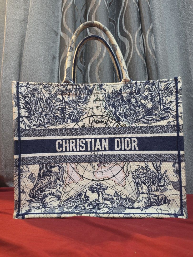 Around the World Book Tote (Category: Luxury Bags & Wallets) located in Ajuy. Submitted by luxe.lifestyle (Listing ID 1469904405, Image 1). Description: Includes: -dust bag Please don't hesitate to chat seller for further Questions..