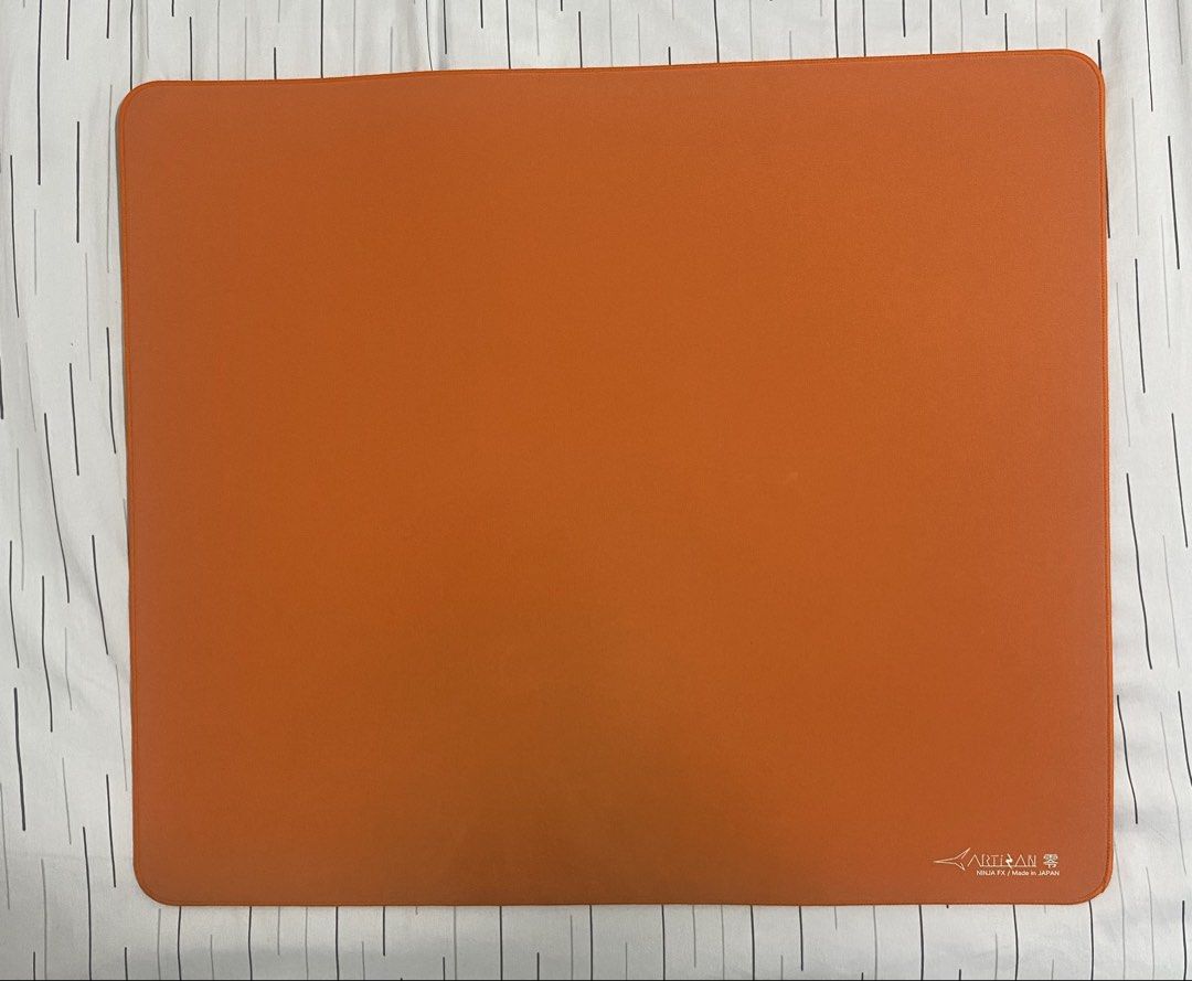 Artisan FX Zero Soft XL - Daidai Orange (Category: Mouse & Mousepads) located in Tarlac. Submitted by notlion (Listing ID 1469844834, Image 2). Description: Artisan Fx Zero soft xl Issues: Damage on the base of the pad (see photos 5 and 6). It does not affect the glide and cannot be felt during use. Damaged box. Slight darkening on the bottom part of the pad. Location: Tarlac City Shipping: J&t or LBC (shipping fee shoulder by buyer).