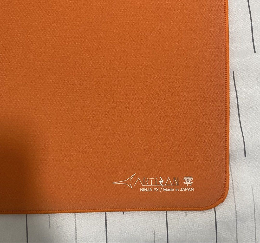 Artisan FX Zero Soft XL - Daidai Orange (Category: Mouse & Mousepads) located in Tarlac. Submitted by notlion (Listing ID 1469844834, Image 1). Description: Artisan Fx Zero soft xl Issues: Damage on the base of the pad (see photos 5 and 6). It does not affect the glide and cannot be felt during use. Damaged box. Slight darkening on the bottom part of the pad. Location: Tarlac City Shipping: J&t or LBC (shipping fee shoulder by buyer).