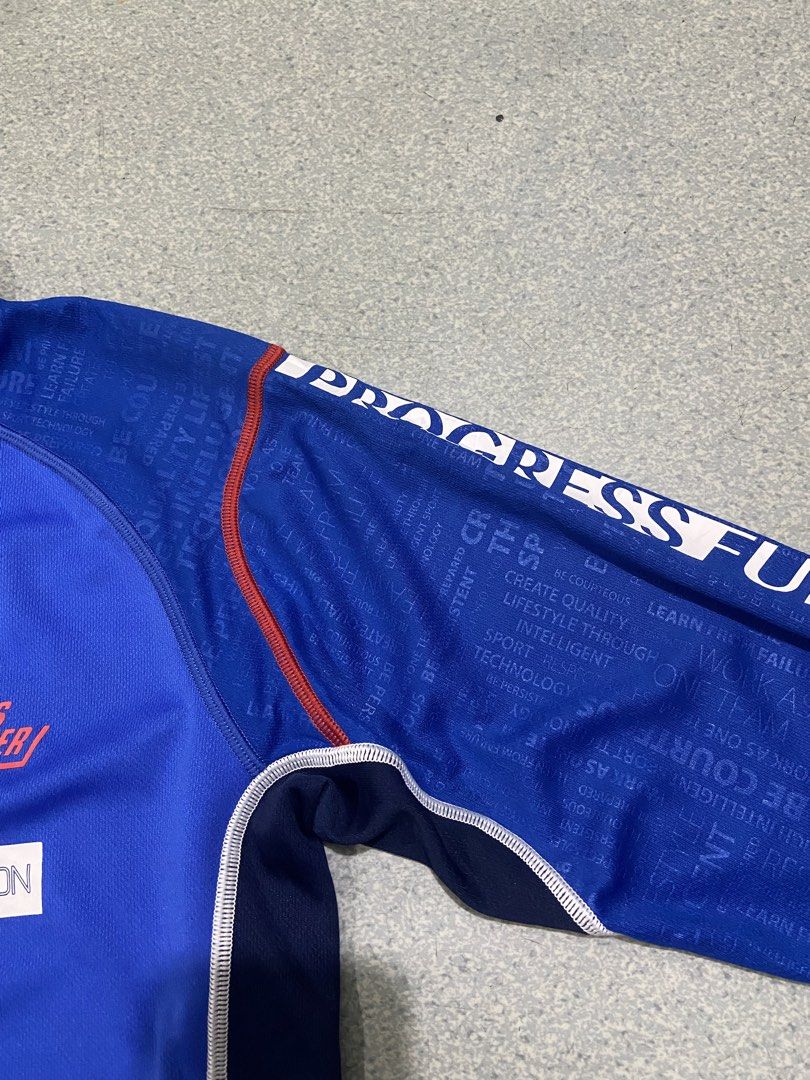Asics A77 Infinite Performance Track Jacket Blue Size S (Category: Coats, Jackets and Outerwear) located in Baguio. Submitted by chicoroy (Listing ID 1469908983, Image 3). Description: - Brand: Asics A77 - Item: Athletic Track Jacket - Color: Royal Blue with Red Zipper Track - Size: S (tag at collar) Dimes:19.5/25 Ukay source need wash - Features: Quarter-zip closure, printed graphics on chest and sleeves ("PROGRESS FURTHER", "TRANSMISSION"), con