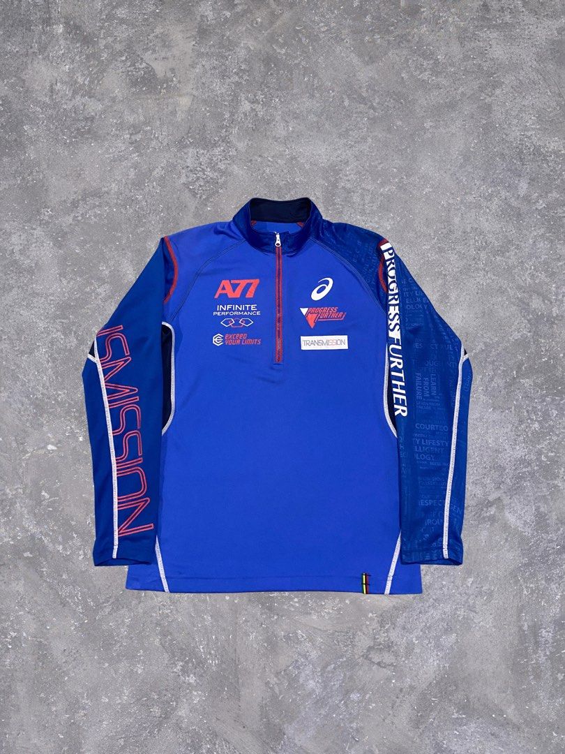 Asics A77 Infinite Performance Track Jacket Blue Size S (Category: Coats, Jackets and Outerwear) located in Baguio. Submitted by chicoroy (Listing ID 1469908983, Image 1). Description: - Brand: Asics A77 - Item: Athletic Track Jacket - Color: Royal Blue with Red Zipper Track - Size: S (tag at collar) Dimes:19.5/25 Ukay source need wash - Features: Quarter-zip closure, printed graphics on chest and sleeves ("PROGRESS FURTHER", "TRANSMISSION"), con