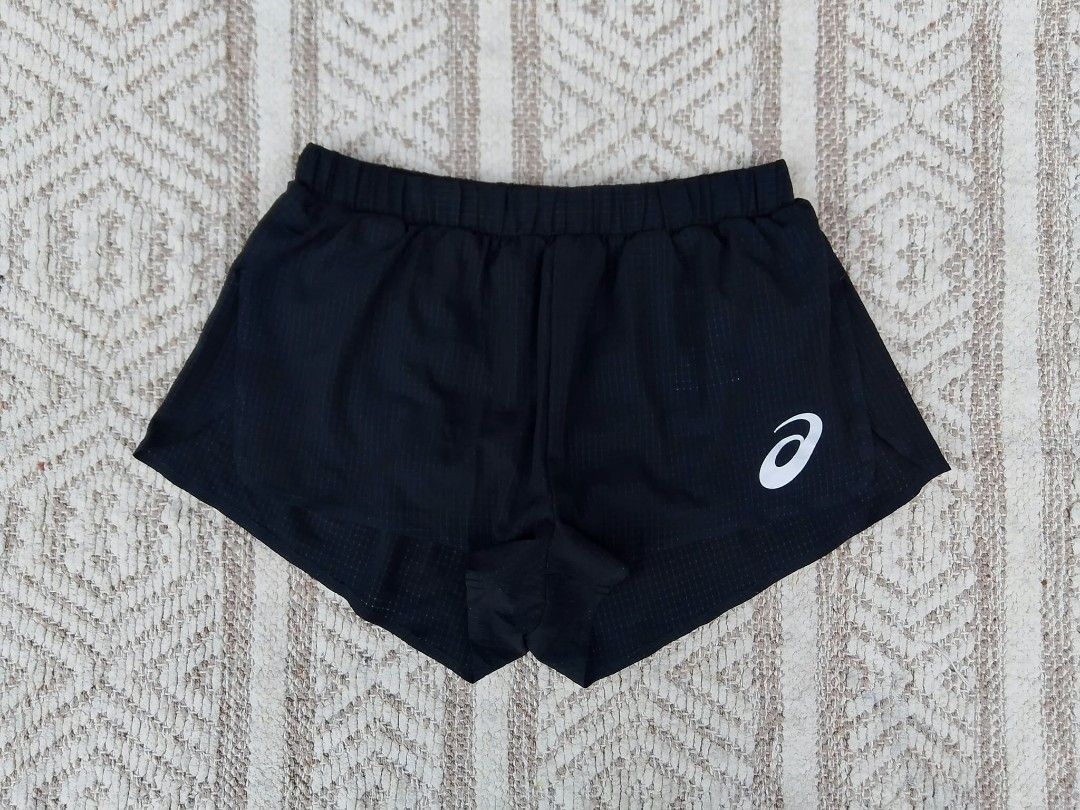 Asics Black Running Shorts Size M (Category: Announcements) located in Quezon City. Submitted by cruz_robert (Listing ID 1469807044, Image 1). Description: Asics Actibreeze Racing Split short - Color: Black with checkered texture pattern - Size: Medium - Features: Elastic waistband and comfortable inner lining - Safety: Reflective Asics logo on the left leg for low-light visibility - Tag Info: Style number 2092A424 - Condition/Use: Lightweight at