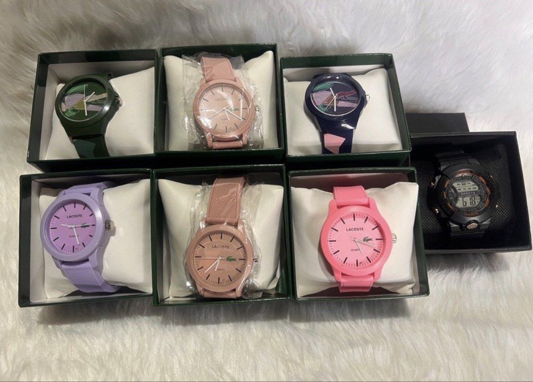 Assorted color watch with box (Category: Luxury Watches) located in Marikina City. Submitted by 1stuffshop (Listing ID 1469783288, Image 1). Description: - Assorted watch collection in individual gift boxes with pillows - 6 vibrant Lacoste silicone strap analog watches (Green, Light Pink, Dark Blue, Purple, Nude Pink, Bright Pink) - 1 Black digital sports watch with stylish orange accents - Great variety for daily wear, matching outfits, or as re