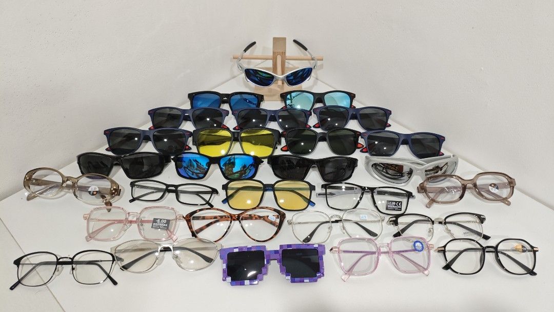 Assorted Sunglasses and Eyeglasses 28pcs (Category: Sunglasses & Eyewear) located in San Jose del Monte. Submitted by jenmallari_ (Listing ID 1469803801, Image 1). Description: - Massive eyewear collection available with a wide variety of styles - Sunglasses: Classic dark lenses, bright blue/yellow, mirrored, and wrap-around sports designs - Eyeglasses: Round, square, clear, tortoiseshell, metal, and plastic frames - Extras: Reading glasses with 