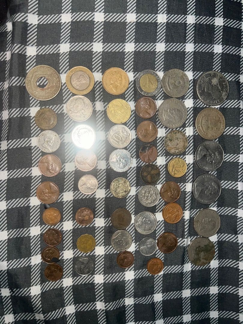 Assorted Vintage Foreign Coins Collection Lot (Category: Currency) located in Caloocan City. Submitted by joshualari57872 (Listing ID 1469899040, Image 1). Description: - Lot of mixed foreign coins from various countries - Includes a variety of sizes, metals, and denominations - Perfect for coin collectors, hobbyists, or art and craft projects - Selling everything together as a single batch - Ships securely from the Philippines Offer kayo mga bos