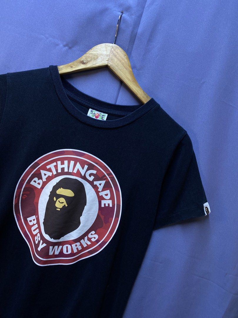 AUTHENTIC BAPE “BUSY WORKS” (Category: Shirts) located in Makati City. Submitted by drip.poww (Listing ID 1469826109, Image 2). Description: - Authentic Bape - Color: Black - Size: small - Dimes: 19x25 - Authentic - Excellent condition - Need wash, fresh from bale - Material: 100% Cotton Please don’t expect too much—these are thrifted (ukay) items. 😊 !!STILL NEGOTIABLE!!.
