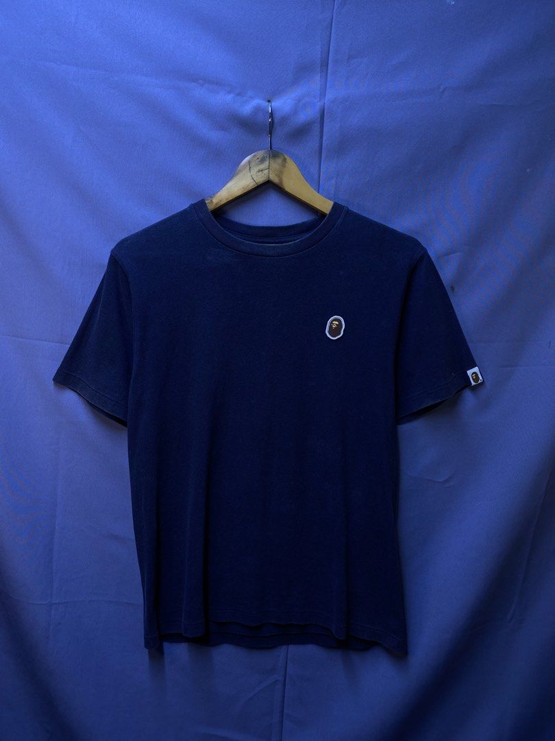 AUTHENTIC BAPE “point” TEE (Category: Tshirts & Polo Shirts ) located in Makati City. Submitted by drip.poww (Listing ID 1469821074, Image 1). Description: - Authentic Bape - Color: Navy blue - Size: Small - Dimes: 19x25 - Authentic - Excellent condition - Need wash, fresh from bale - Material: 100% Cotton Please don’t expect too much—these are thrifted (ukay) items. 😊 !!STILL NEGOTIABLE!!.