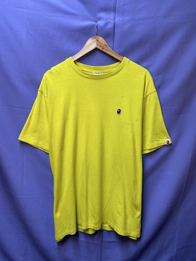 AUTHENTIC BAPE “POINT” TEE (Category: Tshirts & Polo Shirts ) located in Makati City. Submitted by drip.poww (Listing ID 1469821509, Image 1). Description: - Authentic Bape - Color: Mustard - Size: XL - Dimes: 24x30 - Authentic - Excellent condition - Need wash, fresh from bale - Material: 100% Cotton Please don’t expect too much—these are thrifted (ukay) items. 😊 !!STILL NEGOTIABLE!!.