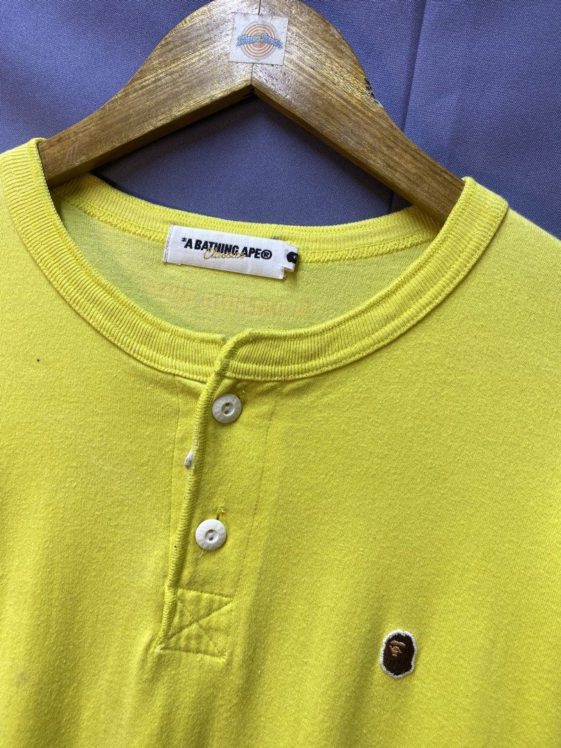 AUTHENTIC BAPE POINT TEE (Category: Tshirts & Polo Shirts ) located in Makati City. Submitted by drip.poww (Listing ID 1469825074, Image 3). Description: - Authentic Bape - Color: Yellow - Size: Meduim - Dimes: 20x28 - Authentic - Excellent condition - Need wash, fresh from bale - Material: 100% Cotton Please don’t expect too much—these are thrifted (ukay) items. 😊 !!STILL NEGOTIABLE!!.