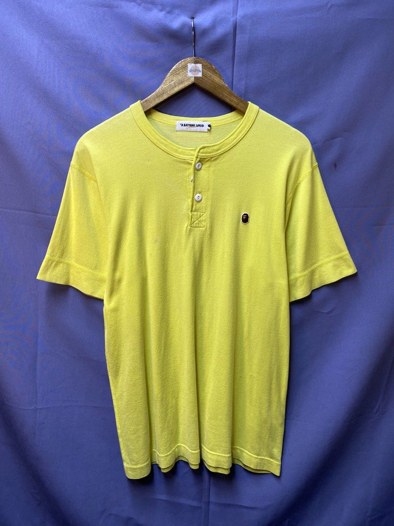 AUTHENTIC BAPE POINT TEE (Category: Tshirts & Polo Shirts ) located in Makati City. Submitted by drip.poww (Listing ID 1469825074, Image 1). Description: - Authentic Bape - Color: Yellow - Size: Meduim - Dimes: 20x28 - Authentic - Excellent condition - Need wash, fresh from bale - Material: 100% Cotton Please don’t expect too much—these are thrifted (ukay) items. 😊 !!STILL NEGOTIABLE!!.