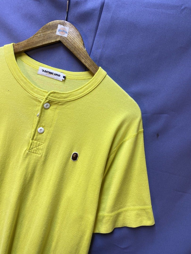 AUTHENTIC BAPE POINT TEE (Category: Tshirts & Polo Shirts ) located in Makati City. Submitted by drip.poww (Listing ID 1469825074, Image 2). Description: - Authentic Bape - Color: Yellow - Size: Meduim - Dimes: 20x28 - Authentic - Excellent condition - Need wash, fresh from bale - Material: 100% Cotton Please don’t expect too much—these are thrifted (ukay) items. 😊 !!STILL NEGOTIABLE!!.