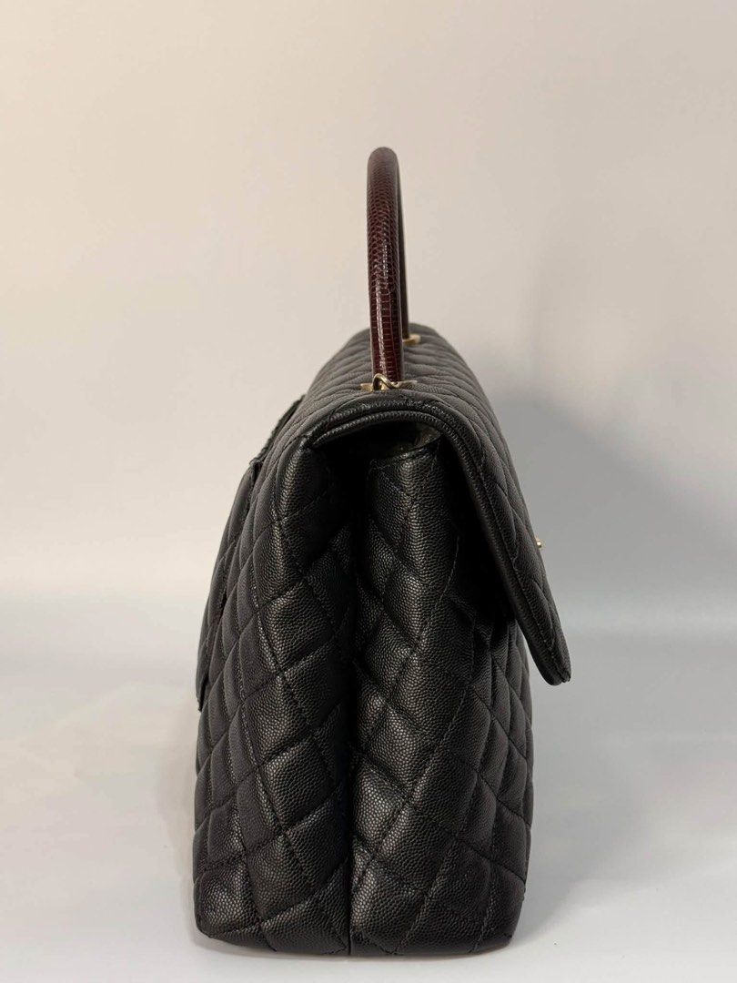 Authentic Chanel (Category: Luxury Bags & Wallets) located in Manila. Submitted by chloe_luxuries (Listing ID 1469926925, Image 3). Description: Guaranteed Original Chanel CoCo handle Lizard black caviar gold hardware Large size Series 24 Comes with dustbag authenticity card and box Pm for those interested .