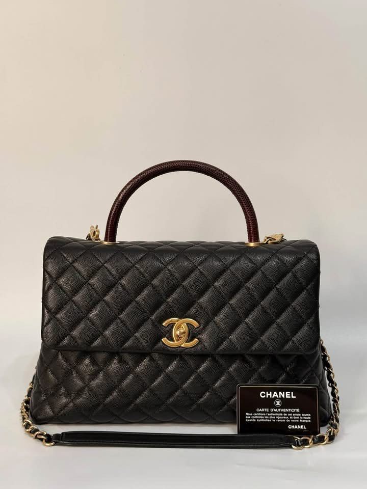 Authentic Chanel (Category: Luxury Bags & Wallets) located in Manila. Submitted by chloe_luxuries (Listing ID 1469926925, Image 1). Description: Guaranteed Original Chanel CoCo handle Lizard black caviar gold hardware Large size Series 24 Comes with dustbag authenticity card and box Pm for those interested .