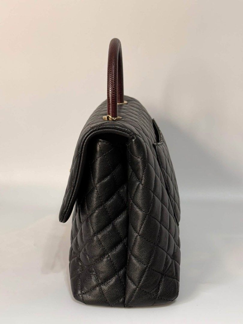 Authentic Chanel (Category: Luxury Bags & Wallets) located in Manila. Submitted by chloe_luxuries (Listing ID 1469926925, Image 2). Description: Guaranteed Original Chanel CoCo handle Lizard black caviar gold hardware Large size Series 24 Comes with dustbag authenticity card and box Pm for those interested .