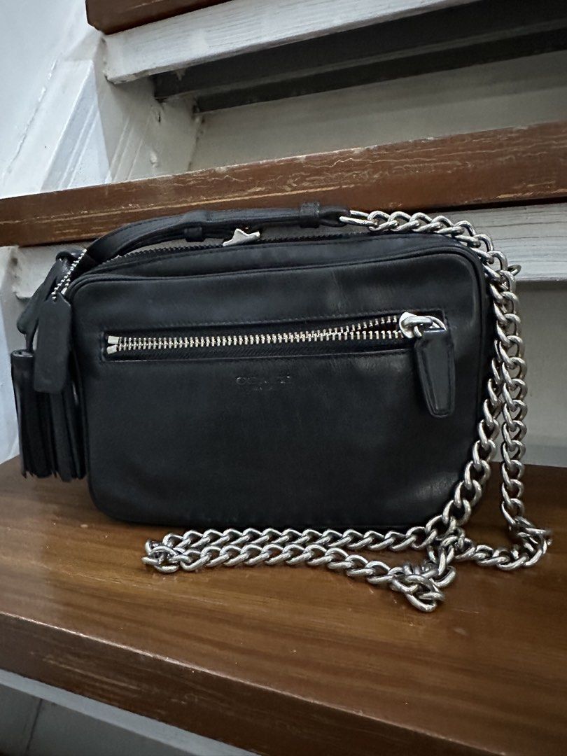 authentic coach legacy sling bag (Category: Cross-body Bags) located in Manila. Submitted by ichibangkawai (Listing ID 1469790900, Image 1). Description: authentic coach legacy sling bag no flaws /minor signs of used black leather no rubs / no chipping med size .