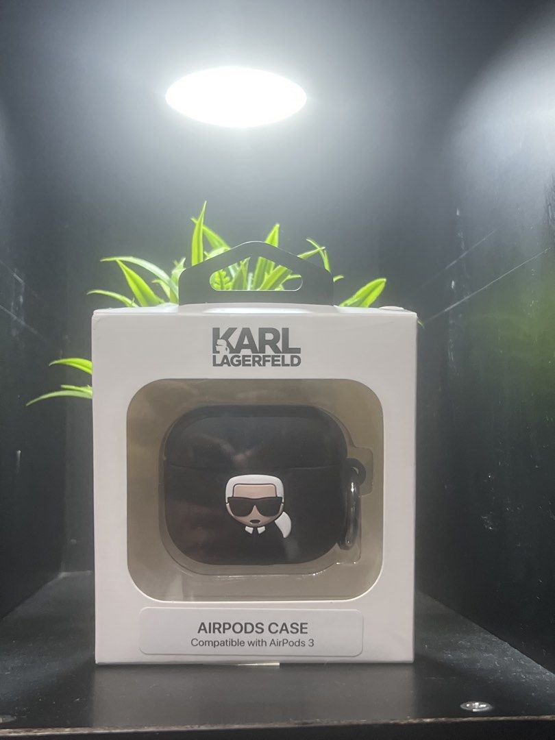 Authentic Karl Lagerfeld AirPods 3 Case Black (Category: Earphones) located in Manila. Submitted by trustedceller (Listing ID 1469802667, Image 1). Description: - Brand: Karl Lagerfeld - Compatibility: AirPods 3 - Material: Durable black silicone - Design: Features the signature designer icon character - Convenience: Includes a metal ring clip to attach to bags or keys - Protection: Guards your charging case against daily drops and scratches - Pa