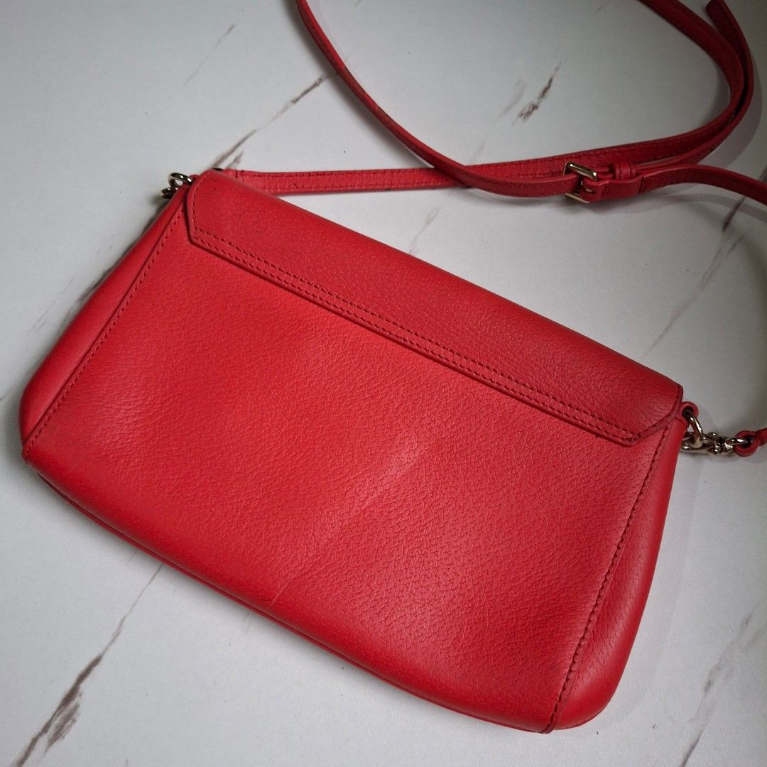 AUTHENTIC Kate Spade Crossbody Bag (Category: Cross-body Bags) located in Caloocan City. Submitted by mei56313 (Listing ID 1469885491, Image 3). Description: - preloved Kate Spade New York crossbody bag in hot pink color - ORIGINAL; super cute but I only used this twice kasi nahihirapan ako bagayan yung color - has black color transfers due to storage; I don't know how to clean/repair it - interior is still very pretty as well as the hardware - w