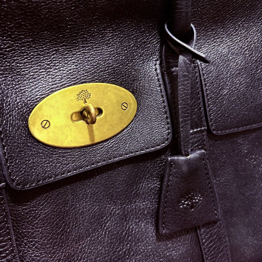 Authentic Mulberry Black Bayswater Bag (Category: Luxury Bags & Wallets) located in Binangonan. Submitted by makoleksyon (Listing ID 1469791881, Image 3). Description: Excellent condition Like new No flaws Comes with dust bag Size: H-10 x W-14 x D-6 inches Bought in Japan 💯% Authentic Money back guarantee .
