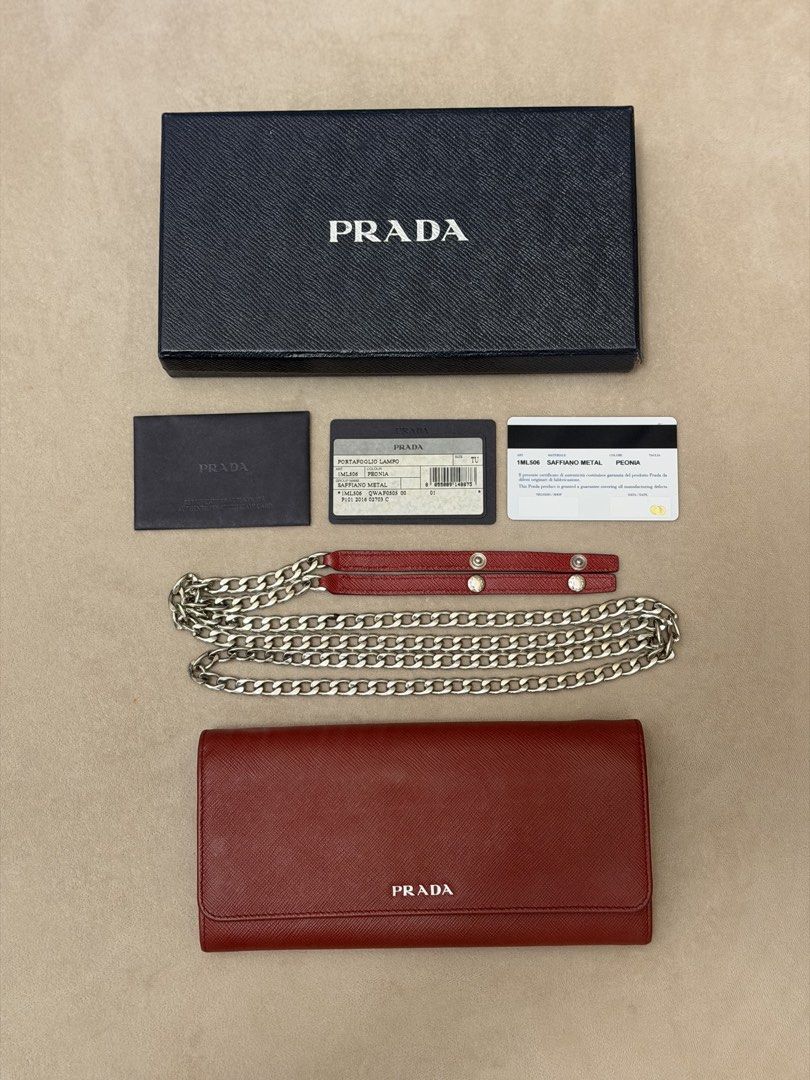 Authentic Prada Saffiano Burgundy Wallet on Chain (Category: Wallets & Card holders) located in Manila. Submitted by maria_2326 (Listing ID 1469927768, Image 1). Description: 💯% Authentic w/box, sling, prada card, booklet Location: Manila/QC.