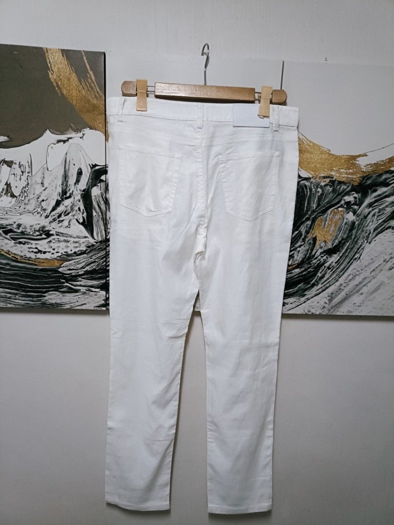 AUTHENTIC PRADA Slim Fit Tapered Denim Jeans (Category: Activewear) located in Manila. Submitted by bvnnie (Listing ID 1469780520, Image 3). Description: AUTHENTIC PRADA Slim Fit Tapered Denim Jeans Waistline/Widht Lenght/ fittings is LARGE Excellent Condition Issue,0 Message if you have any other question about sizing. We do shipping nation wide I'm also open for video call so that you can see the item you 're interested to buy. Courier, DHL, JN