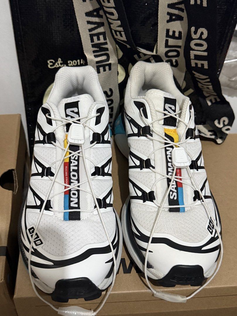 Authentic Salomon XT-6 Black White Blue Curacao (Category: Sneakers) located in Manila. Submitted by niemaedc (Listing ID 1469815979, Image 2). Description: - Model: Salomon S-Lab XT-6 Soft Ground White Blue Curacao - Colorway: White upper with black cage overlays and light blue midsole accents - Fit & Tech: Quicklace system with toggle, SensiFit and EndoFit lockdown, plus OrthoLite insoles - Traction: Chunky lugged outsole built for outdoor terr