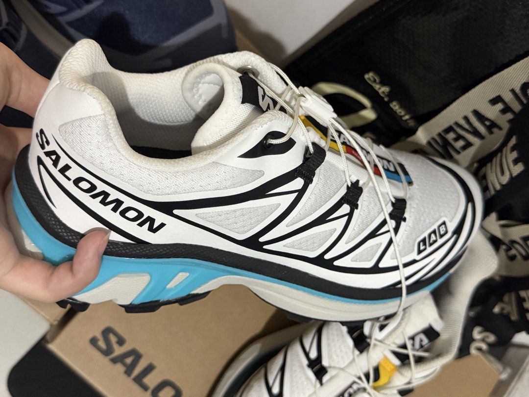 Authentic Salomon XT-6 Black White Blue Curacao (Category: Sneakers) located in Manila. Submitted by niemaedc (Listing ID 1469815979, Image 3). Description: - Model: Salomon S-Lab XT-6 Soft Ground White Blue Curacao - Colorway: White upper with black cage overlays and light blue midsole accents - Fit & Tech: Quicklace system with toggle, SensiFit and EndoFit lockdown, plus OrthoLite insoles - Traction: Chunky lugged outsole built for outdoor terr