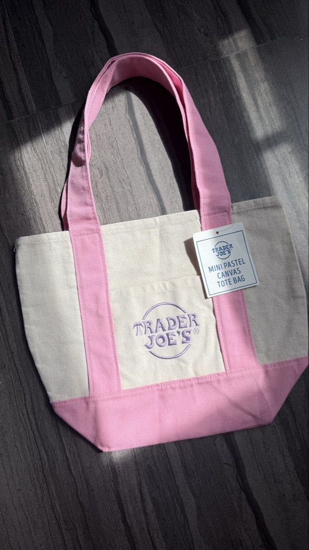 Authentic Trader Joe’s Mini Tote Bag (Category: Tote Bags) located in Manila. Submitted by nic_declutters (Listing ID 1469768840, Image 1). Description: Available in pink and purple .