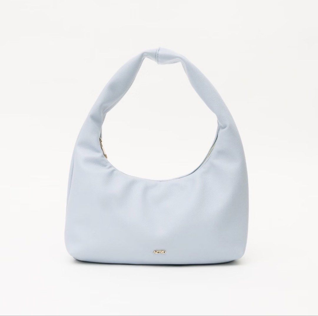Aztrid Small Hobo Bag (Category: Shoulder Bags) located in Navotas City. Submitted by kathyp10 (Listing ID 1469813142, Image 1). Description: - Brand: Aztrid - Style: Small Hobo Bag / Shoulder Bag - Color: Sky - Condition: Excellent / Well-maintained -Price negotiable for sure buyers MOP: Gcash, GoTyme MOD: Lalamove, J&T.