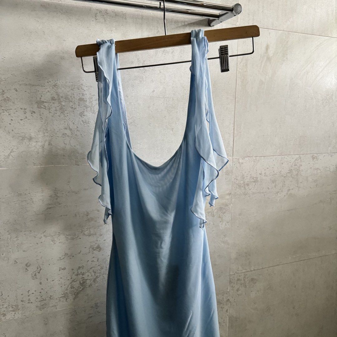 Baby Blue Mini Dress (Category: Dresses) located in Quezon City. Submitted by hanas.declutter (Listing ID 1469818197, Image 2). Description: - brand new white fox scoop back dress with ruffle sleeves in baby blue 🩵 - no when worn since it does not fit me anymore.