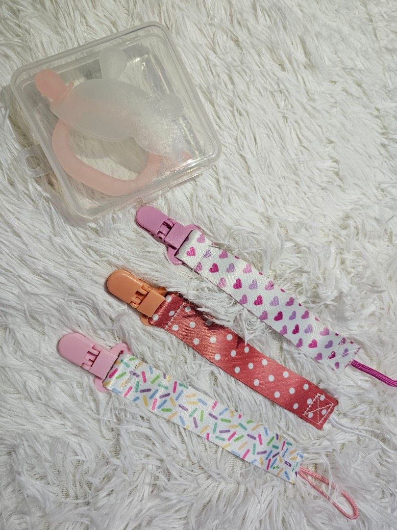Baby Pacifier Clips And Silicone Teether Set (Category: Soothers & Pacifiers) located in Manila. Submitted by pitzdiaz (Listing ID 1469943672, Image 1). Description: FOR SALE ❗️❗️❗️ Pacifier clips and teether BRAND NEW All from my daughter's budol 😁 Actual color and appearance may vary slightly due to lightning, photo angles, and device screen settings. Thank You so much ☺️ less than 50% po mga prices from its original price 😊 .