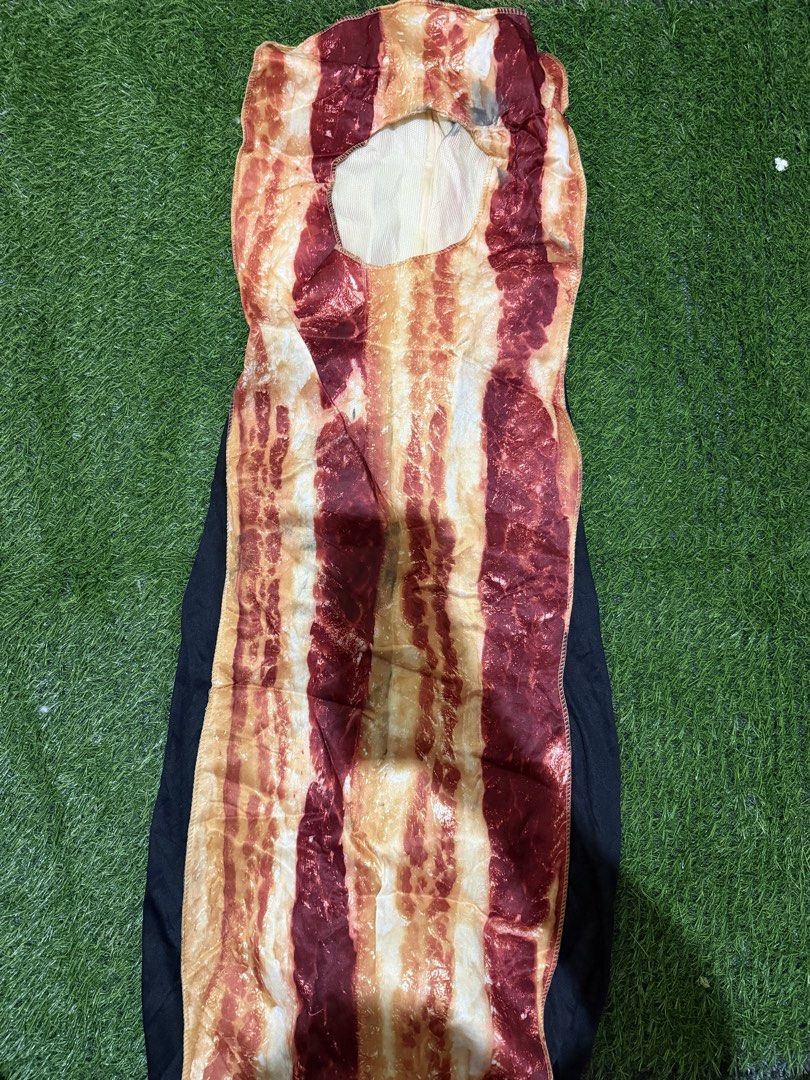 Bacon strip funny costume outfit (Category: Sets or Coordinates) located in San Fernando. Submitted by InvisibleMe (Listing ID 1469764132, Image 1). Description: - Hilarious bacon strip costume with realistic front print - Black fabric backing with a convenient face hole at the top - Lightweight design that easily slips over regular clothes - Perfect for Halloween parties, food-themed events, or funny gifts.