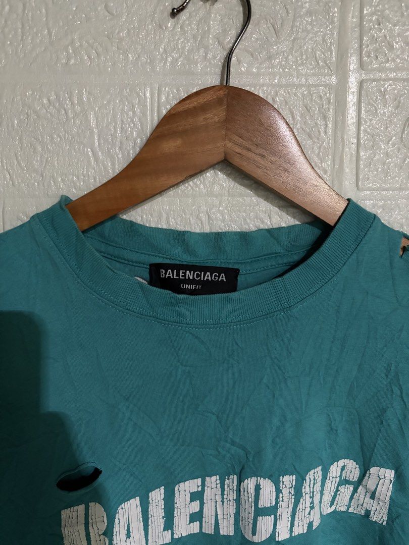 balenciaga distressed design (Category: Formal Shirts) located in Santa Rosa. Submitted by jeremydeas56388 (Listing ID 1469908021, Image 2). Description: size small on tag fit to medium to large no issue .