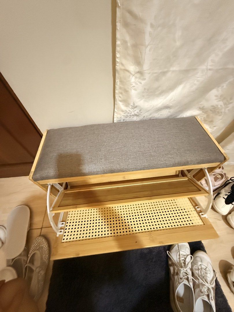 Bamboo Shoe Storage Bench with Padded Seat (Category: Shelves, Cabinets & Racks) located in Mandaluyong City. Submitted by riz_040521 (Listing ID 1469795817, Image 3). Description: - Material: Eco-friendly bamboo frame - Cushion: Comfortable grey upholstered top for seating - Storage: Flip-down compartment with interior shelving - Design: Stylish rattan-style patterned front panel - Function: Keeps your entryway neat and provides a comfortable sp