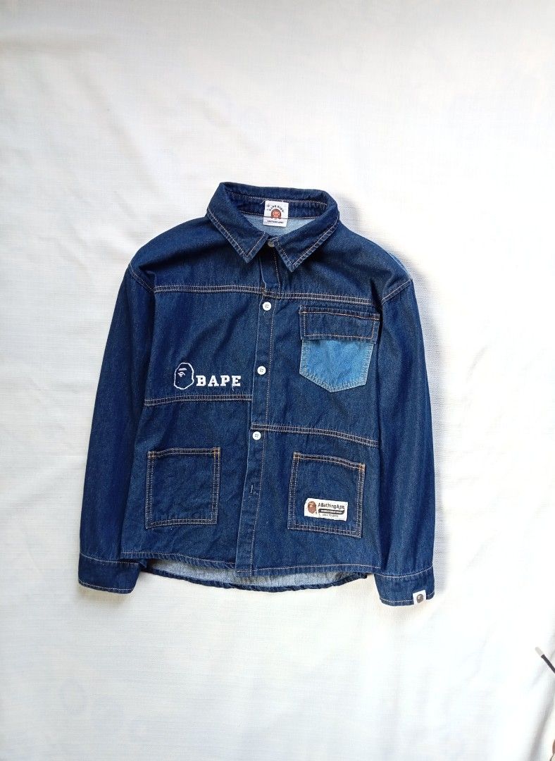 BAPE embroidery script utility denim jacket (Category: Coats, Jackets and Outerwear) located in Bagabag. Submitted by thrift_stories96 (Listing ID 1469928532, Image 2). Description: BAPE embroidery script utility denim jacket unisex Youth size but it can fits adult Small womens Xsmall mens Length - 23.5 Width - 19 Condition - 9/10 Color and cloth - 9.5/10 Flaw - missing 1 button sa lower part Need replacement if needed.