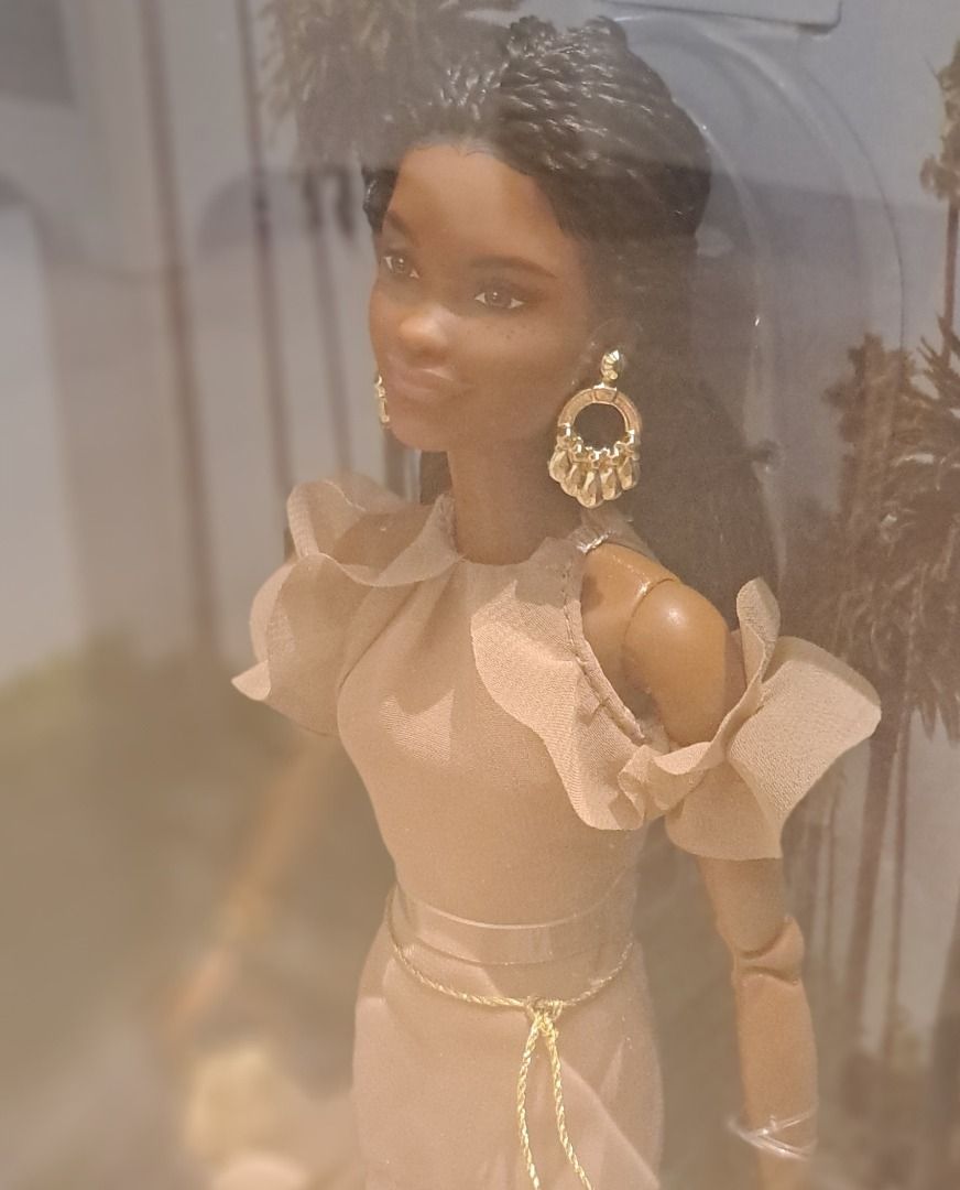 Barbie Signature BarbieStyle Boho Chic Doll NRFB (Category: Kids Toys) located in Muntinlupa City. Submitted by sun8752 (Listing ID 1469773541, Image 2). Description: - Authentic Barbie Signature Brooklyn doll from the exclusive BarbieStyle collection - Stunning dark braided hair and fashionable ruffled beige dress with matching boots - Complete with stylish gold dangling earrings, a chain belt, and a mini handbag - Eye-catching box featuring pal
